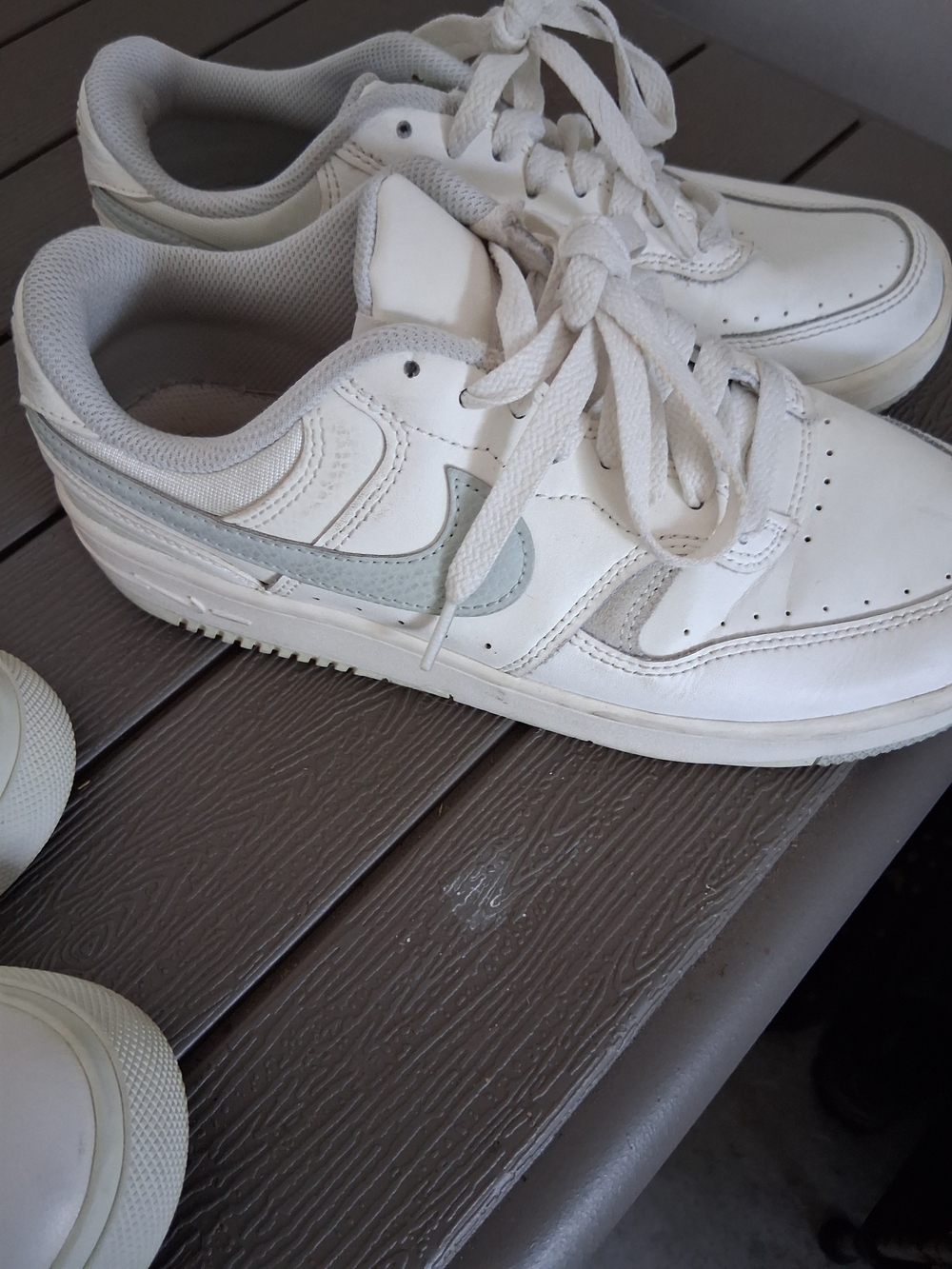 Nike White Low-Top Sneakers with Light Gray Swoosh